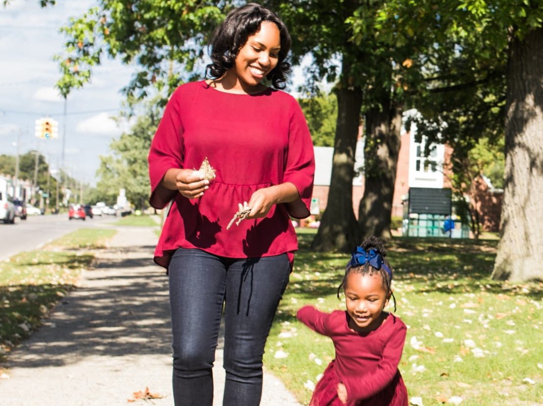 Woman and child - out for walk narrow