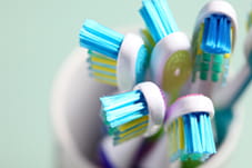 Toothbrushes in a jar