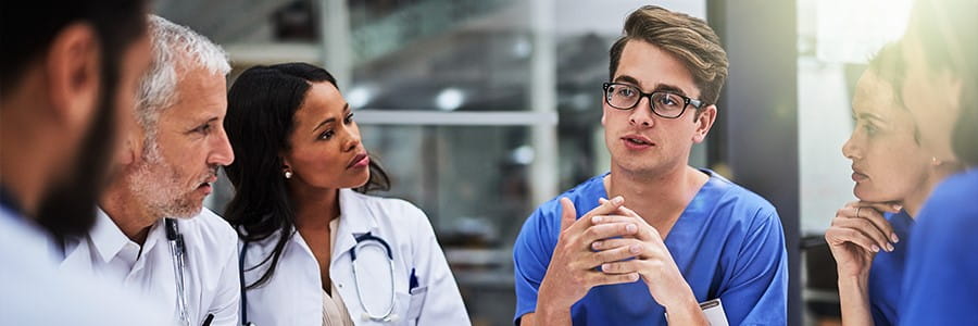 Doctors and Nurses at Table, Care Delivery