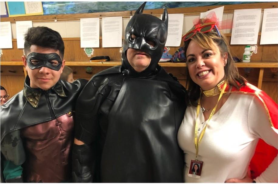 Robin, Batman, Superwoman costumed people Robin, Batman, Superwoman costumed people
