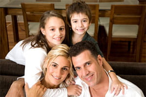 Two children with parents