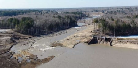 Exposed bottomlands after our completed emergency work to lower the spillway on the Tobacco River side of the Edenville dam.