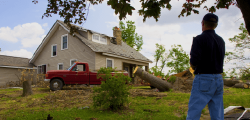 man with truck after tornado