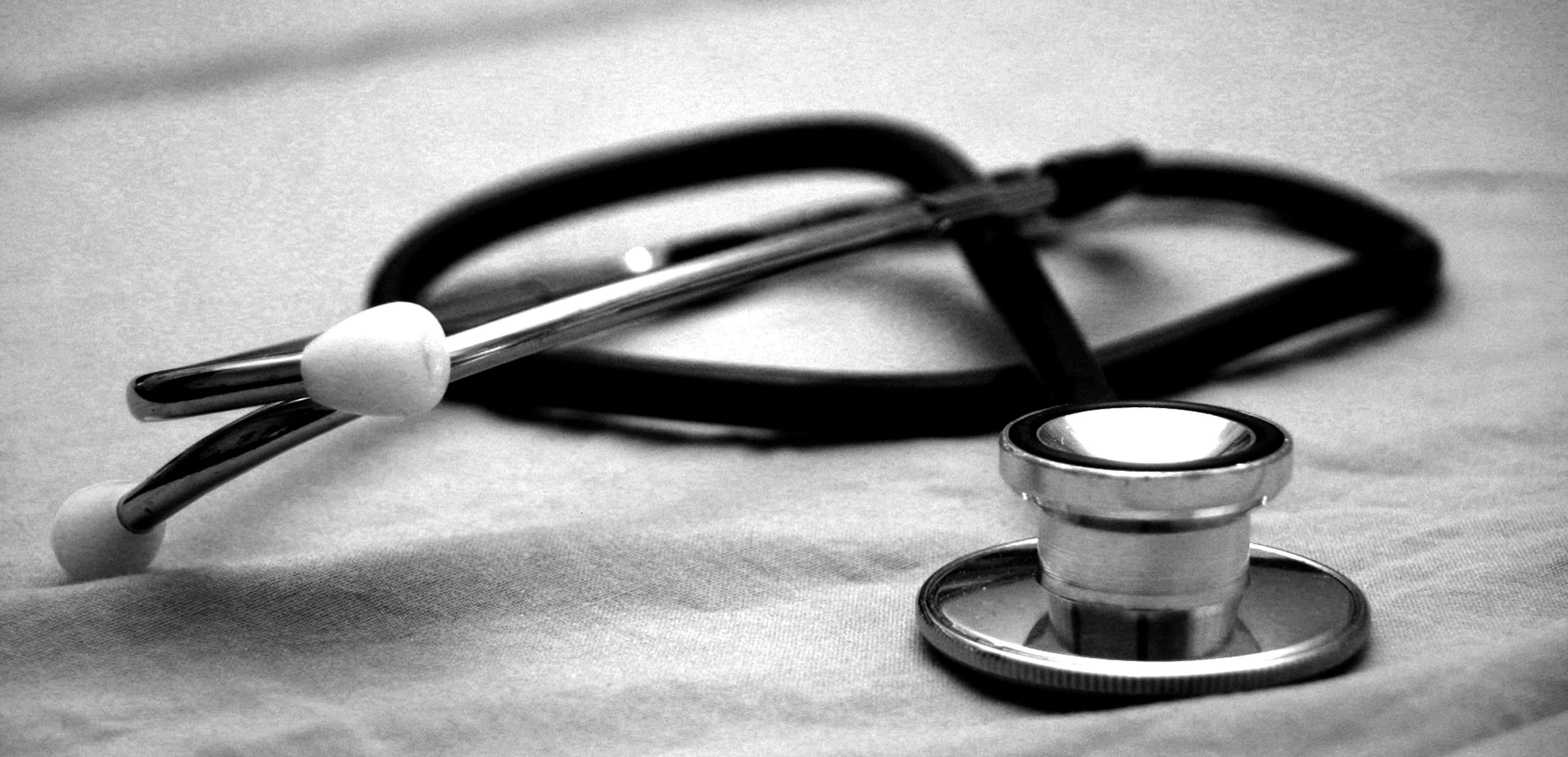 Stethescope on a grey background