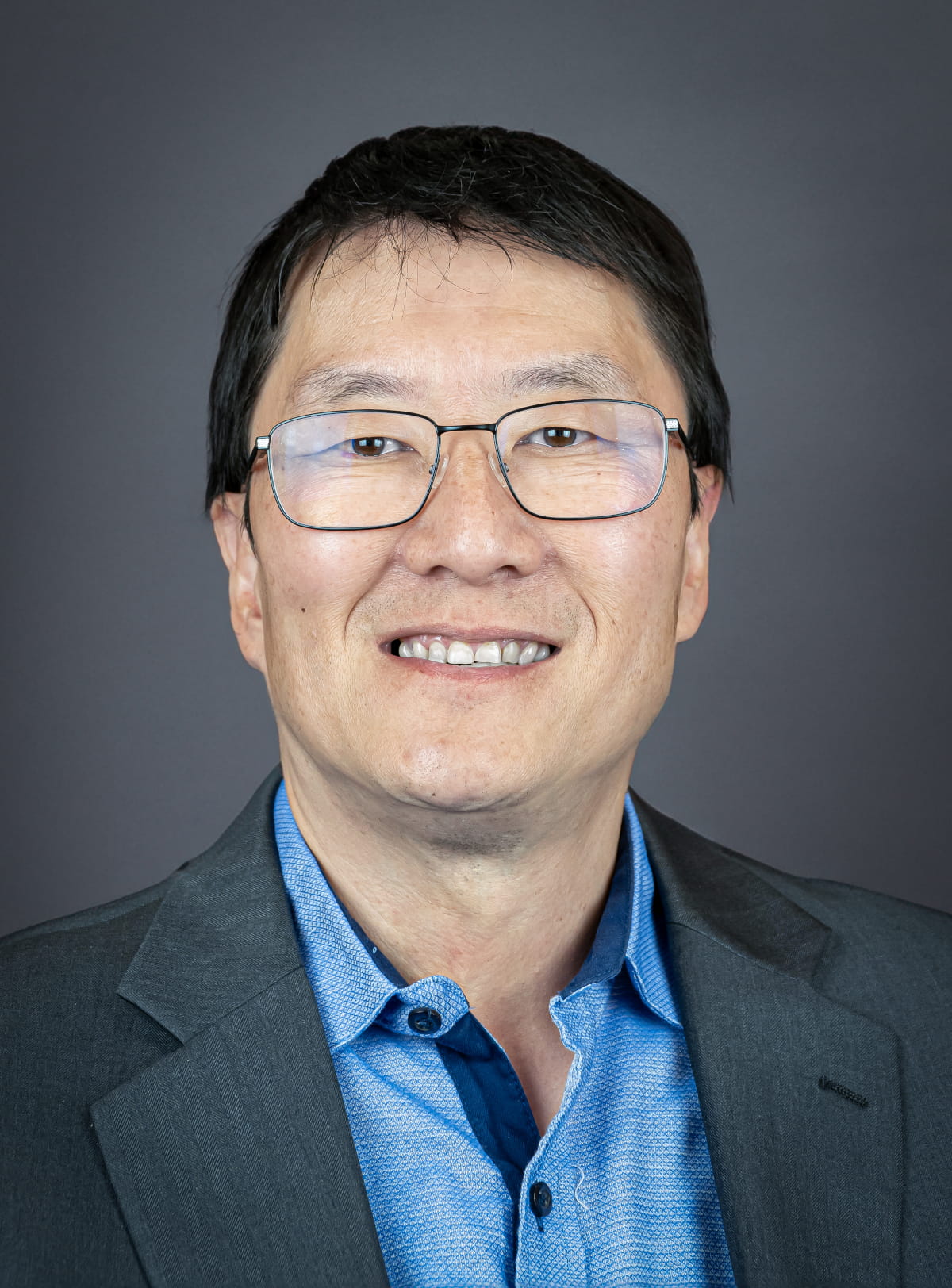 Commissioner Hoon-Yung Hopgood Headshot