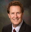 Commissioner Dennis Olshove