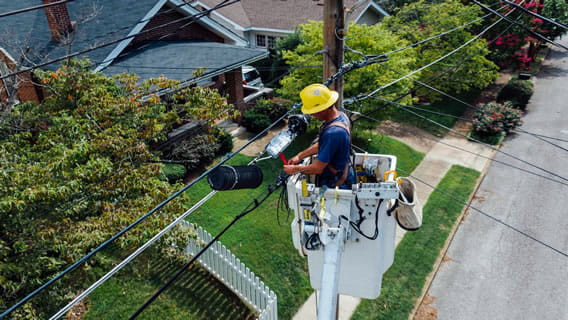 Construction worker on cherry picker