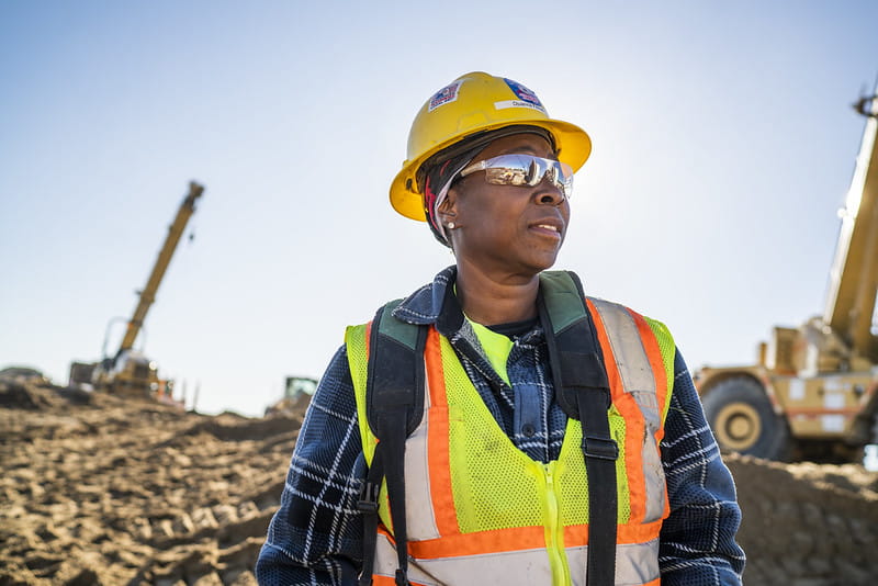 D'Juanna Ferrell standing at a construction site.