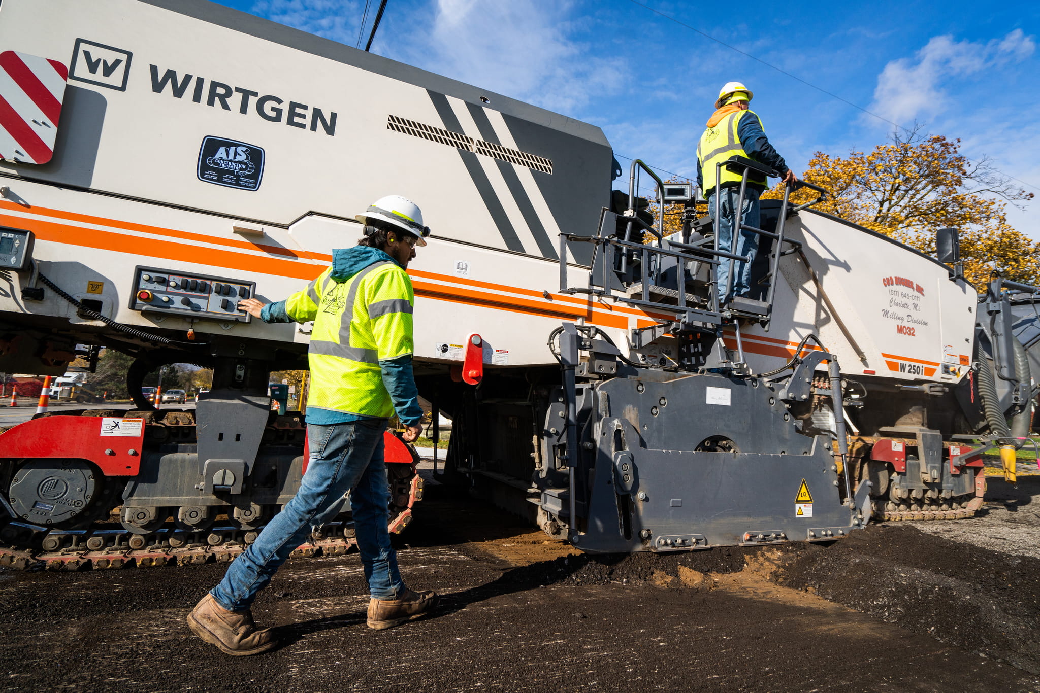 MDOT paving machine paving a road