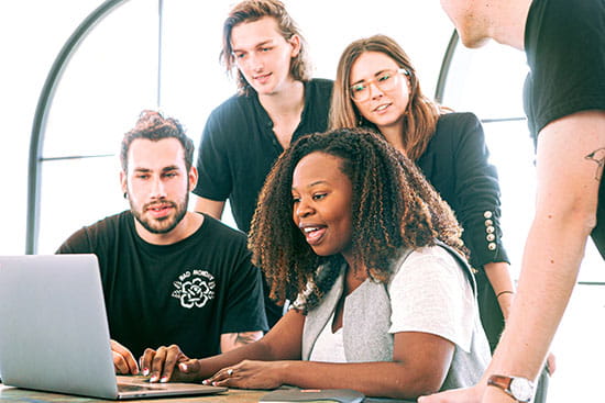 Woman sharing presentation with colleagues