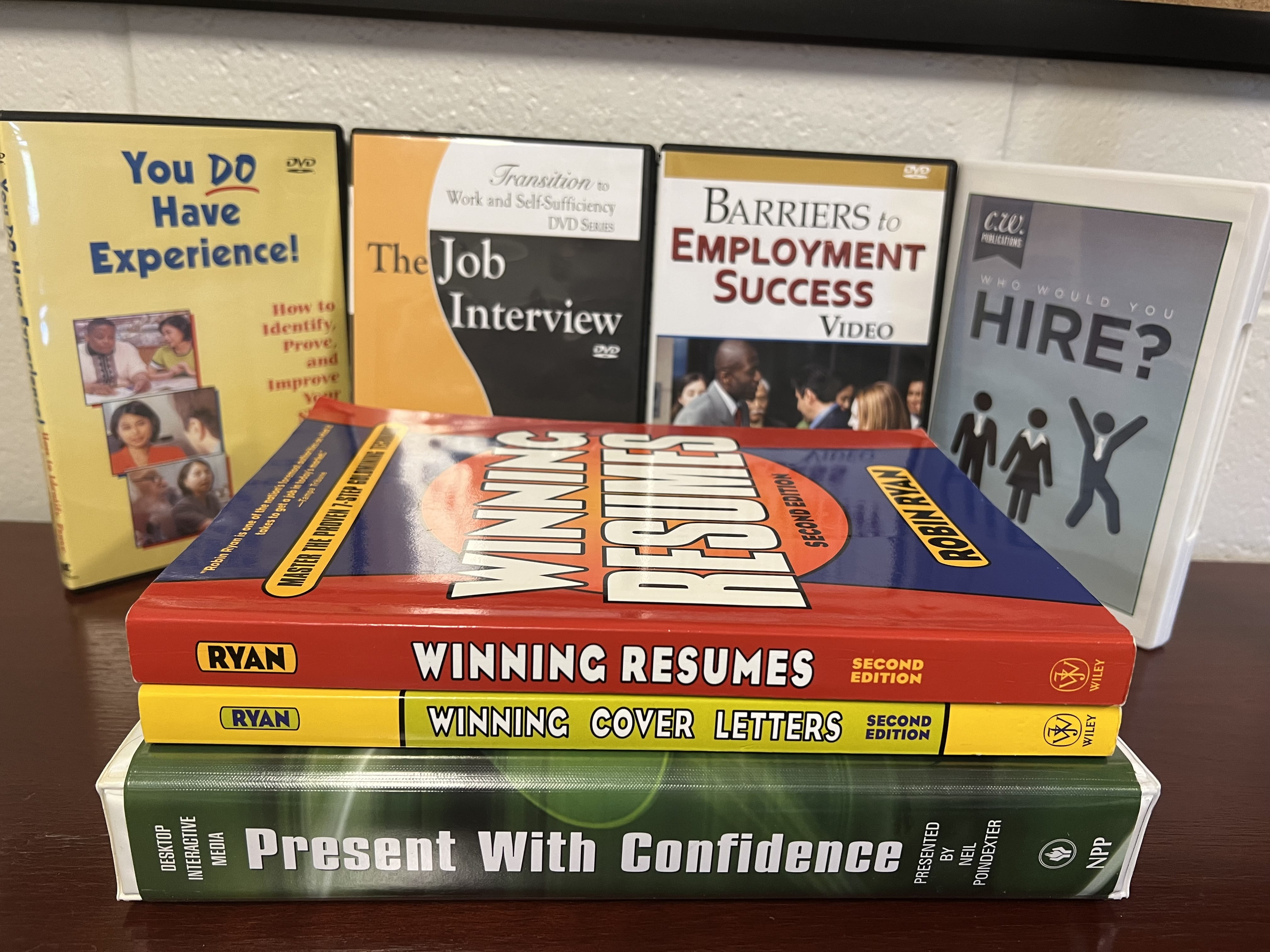 A stack of books of job seeking tools