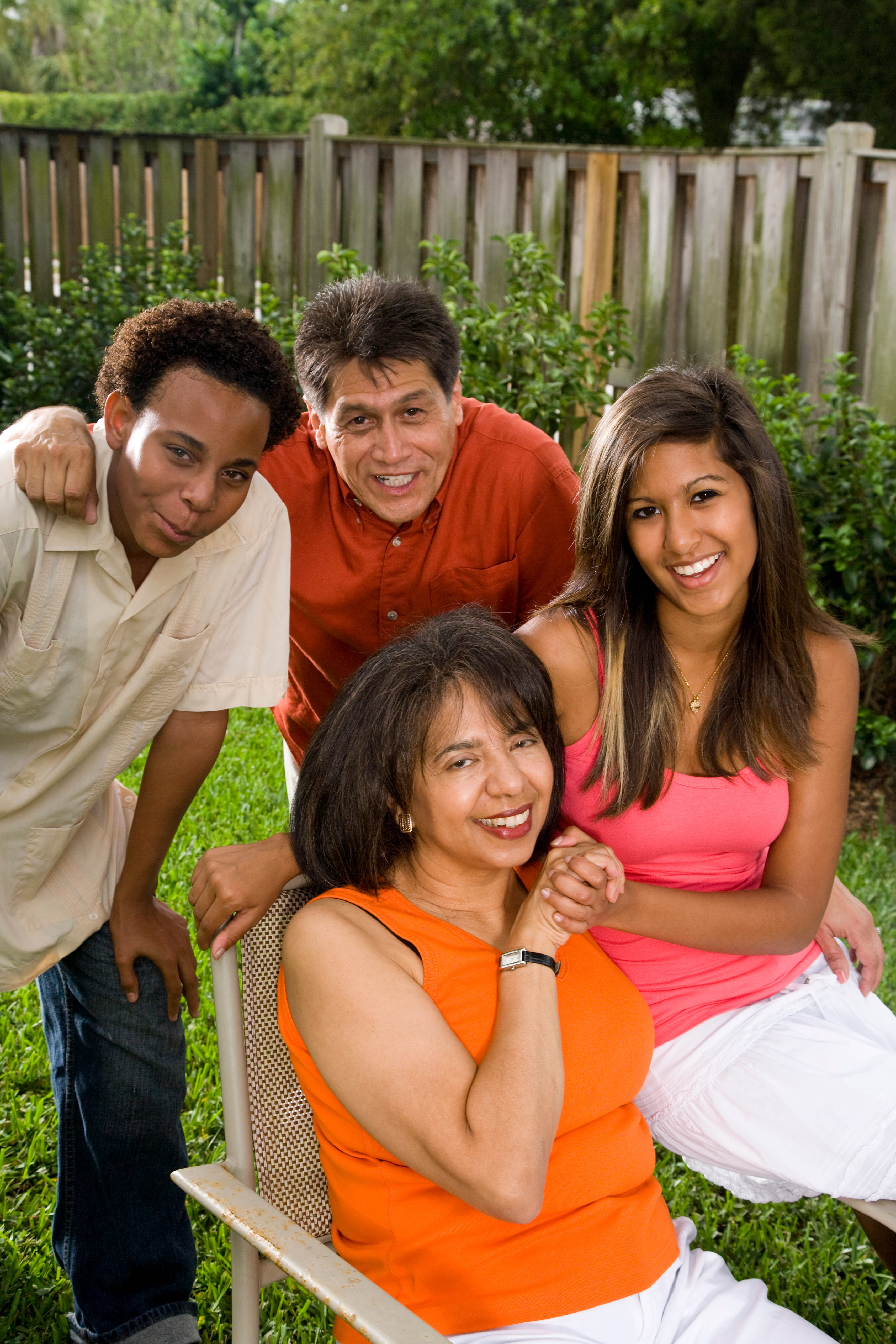Family gathered together in the backyard