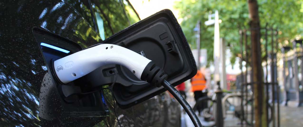 Electric charging cord inside a car.