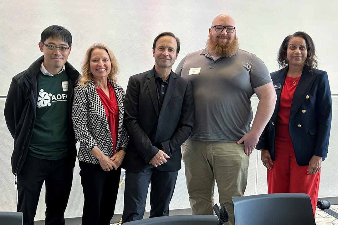 Five panel members stand side by side at the 2025 Abilities, Opportunities and Future of Work (AOFOW) Conference, where they spoke on enhancing recruitment and retention for individuals with disabilities.