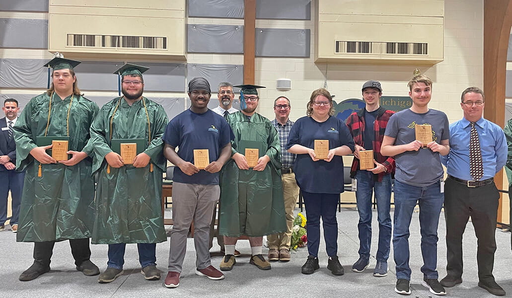 Honor Award recipients and staff members during Michigan Career and Technical Institute's 2024 summer/fall graduation ceremony.