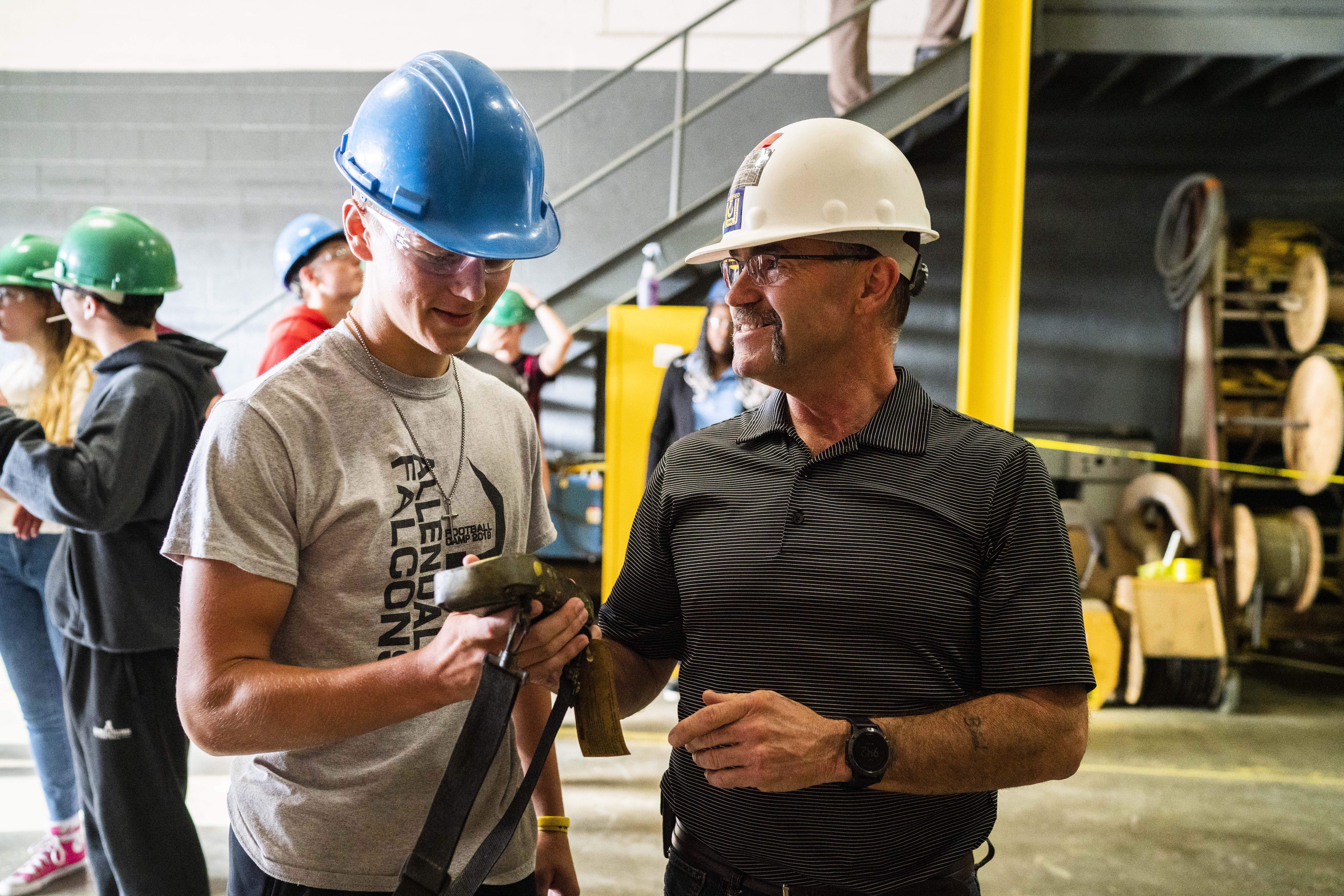 Student learns how to operate crane