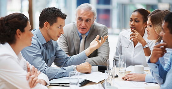 Business meeting with men and women