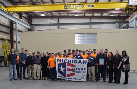 Air Flow Equipment Inc. employees are pictured during the company's MSHARP award ceremony Jan. 8, 2024.