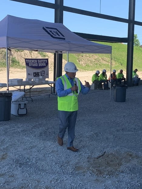 Construction worker speaking