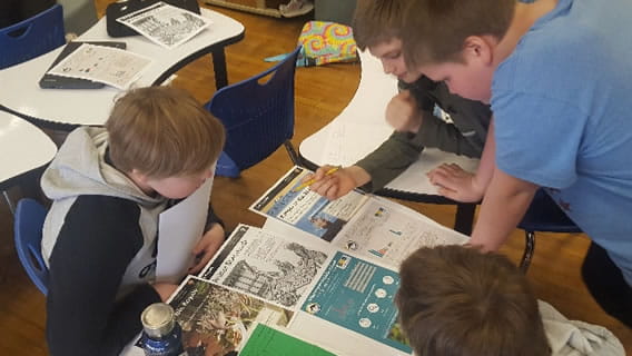 KNHP students comparing signs