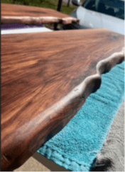 Close up of three wooden shelves laid out on towel.