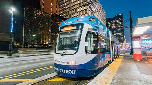 QLine streetcar traveling through Detroit.