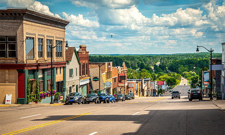 quaint old-style storefronts on a main road in Crystal Falls Michigan