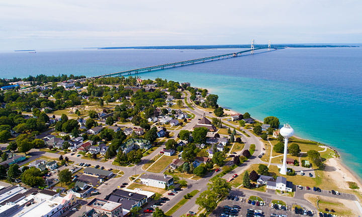 Rural community near water with a bridge across the water