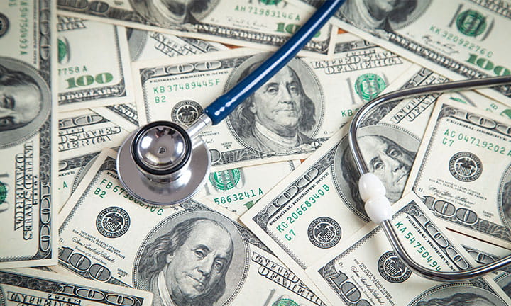 paid medical leave graphic stethoscope and money