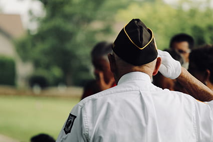 veteran saluting flag 