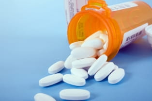 Pills spilled out of prescription bottle