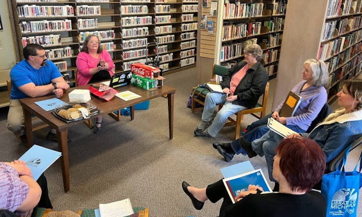 For Libraries Library Staff Certification Hero Image Joe Hamlin and Clare Membiela at Addison Township Public Library