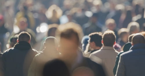 crowd of people from behind backlit
