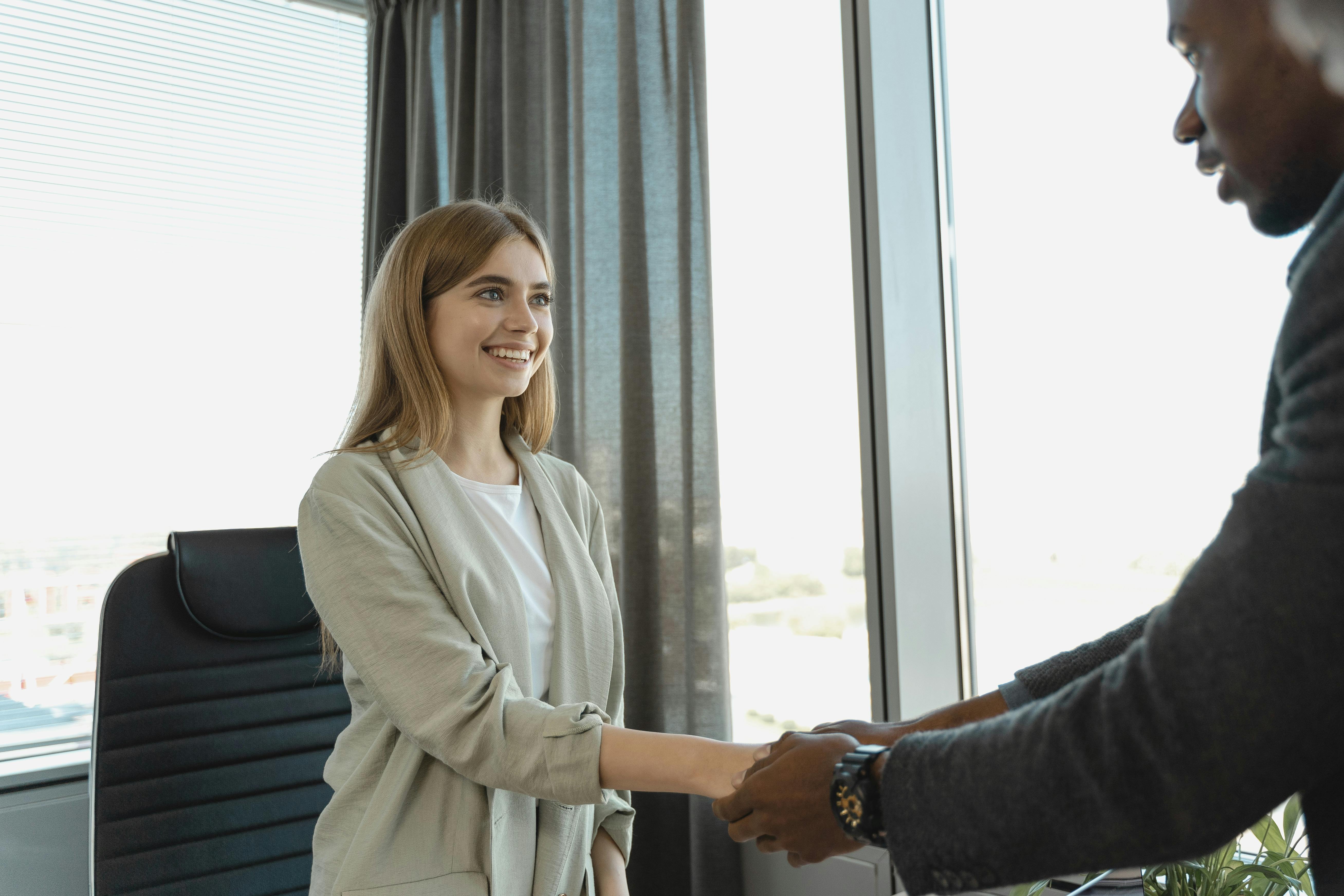 Job seeker shaking hands.