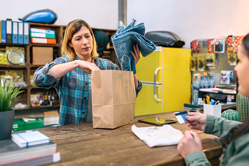 cashier bagging pants
