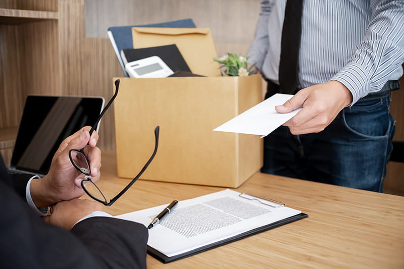 employee handing resignation