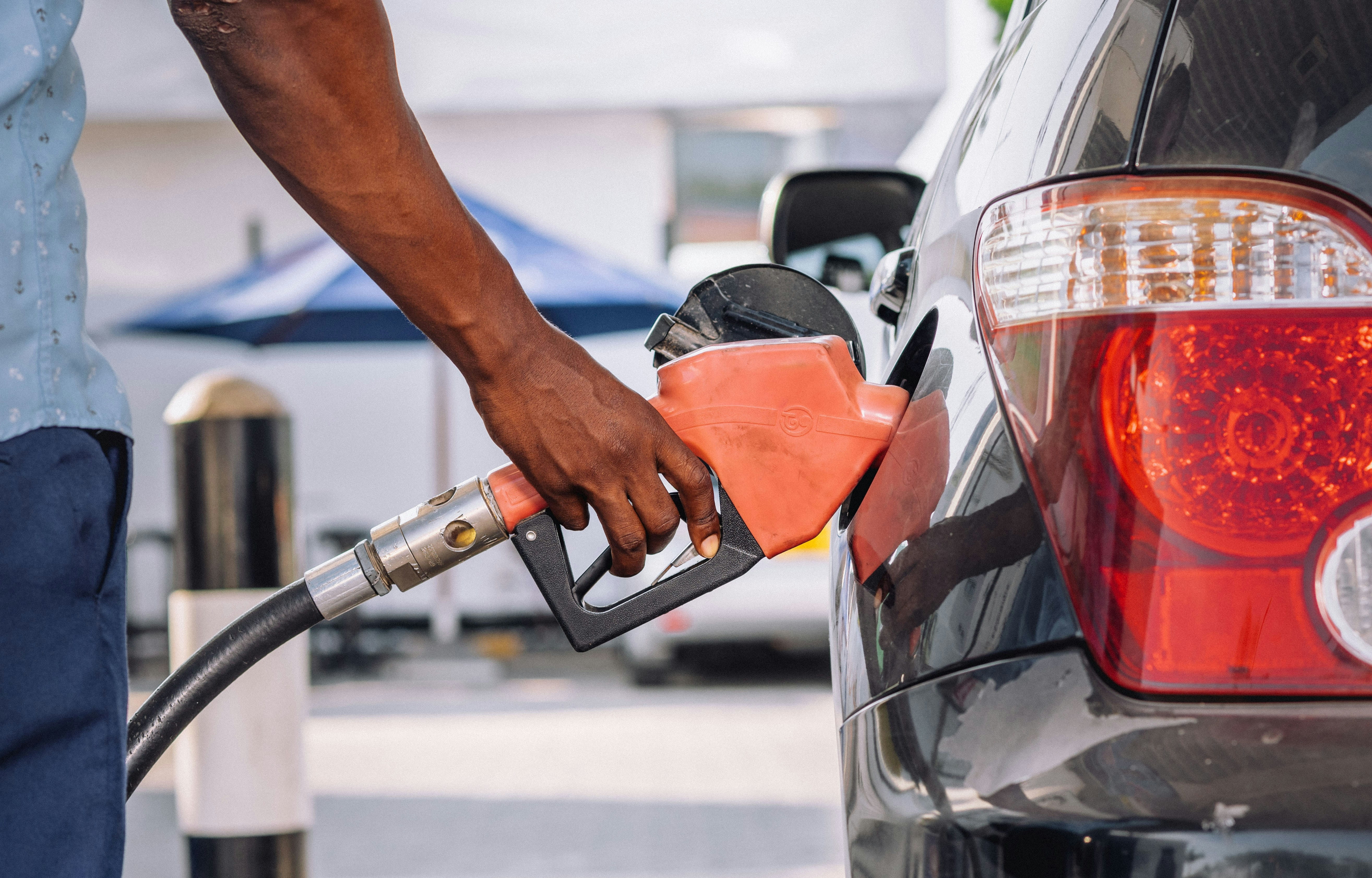 man at gas station