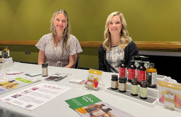 LorAnn representatives set up for meetings at Food Export-Midwest’s Foodservice Buyers Mission at the National Restaurant Association Show in Chicago, May 2023. 