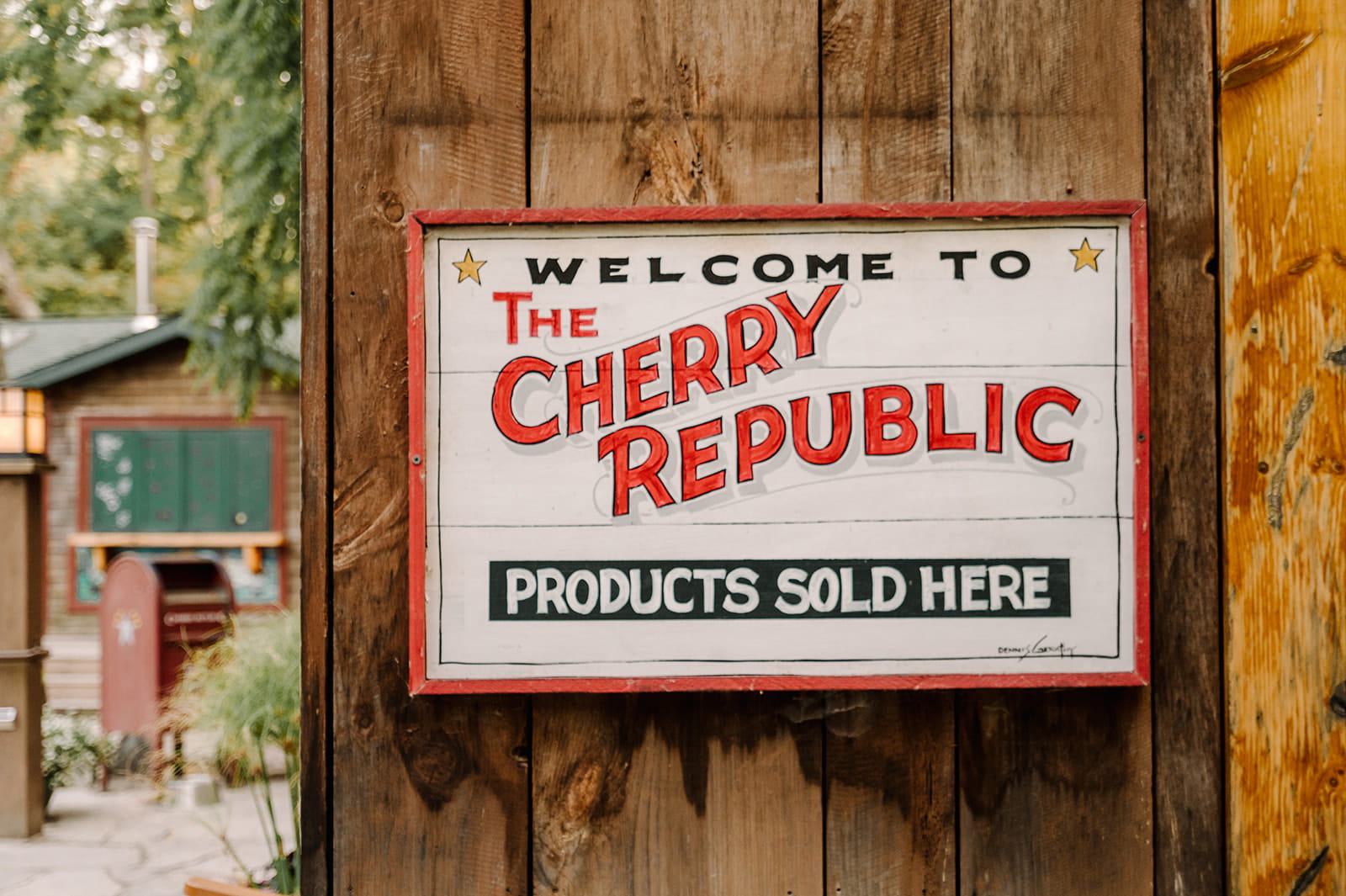 Welcome to The Cherry Republic sign close up image.