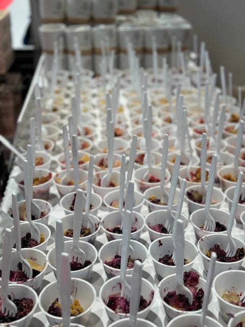 Table full of samples of different pies from Grand Traverse Pie Company.