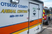 An animal control truck parked at an event