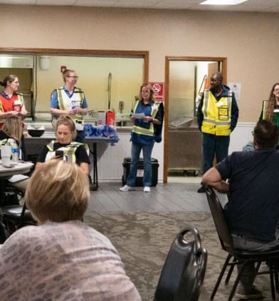 During an emergency action, a person gives a presentation.