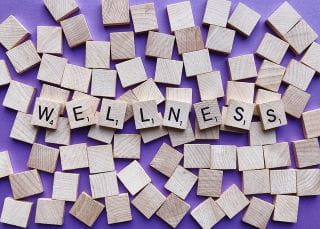 Wellness spelled out in game tiles