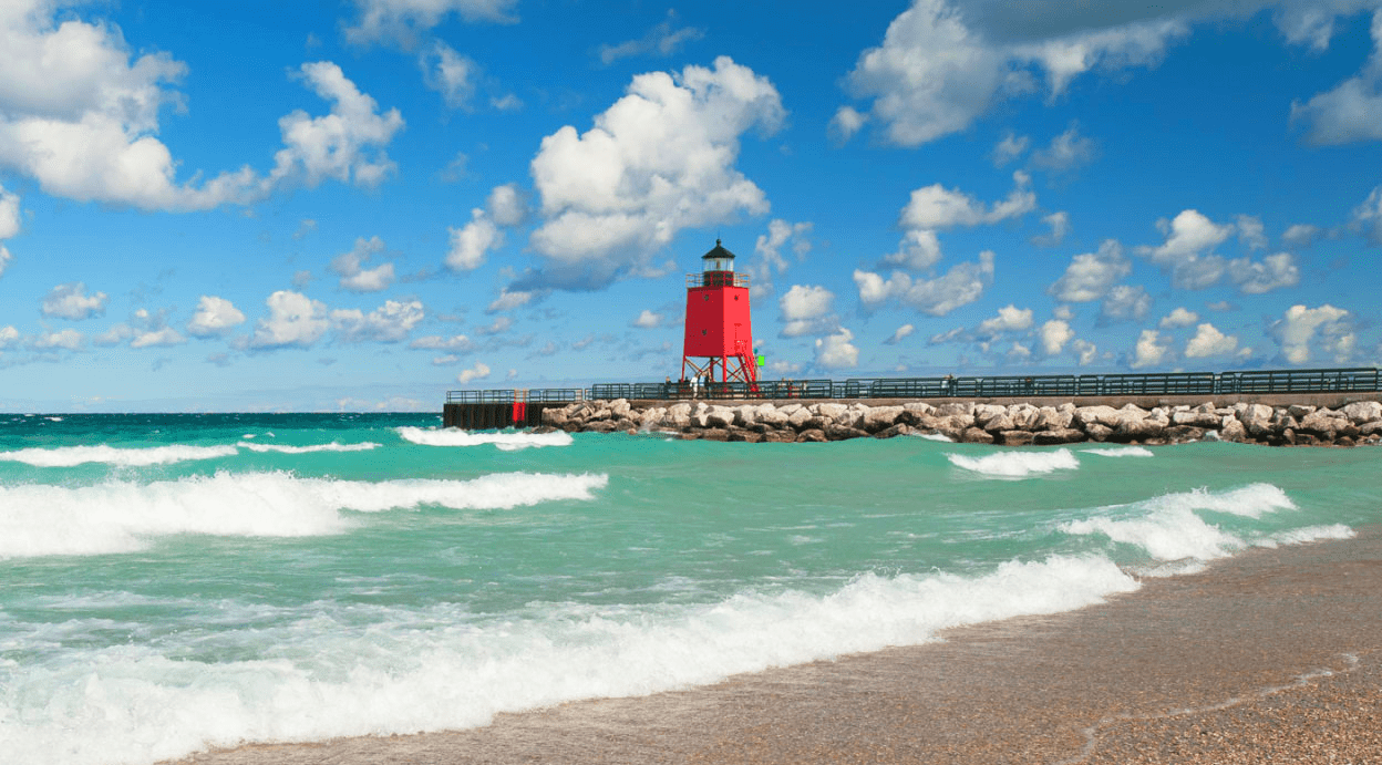Red lighthouse on beach