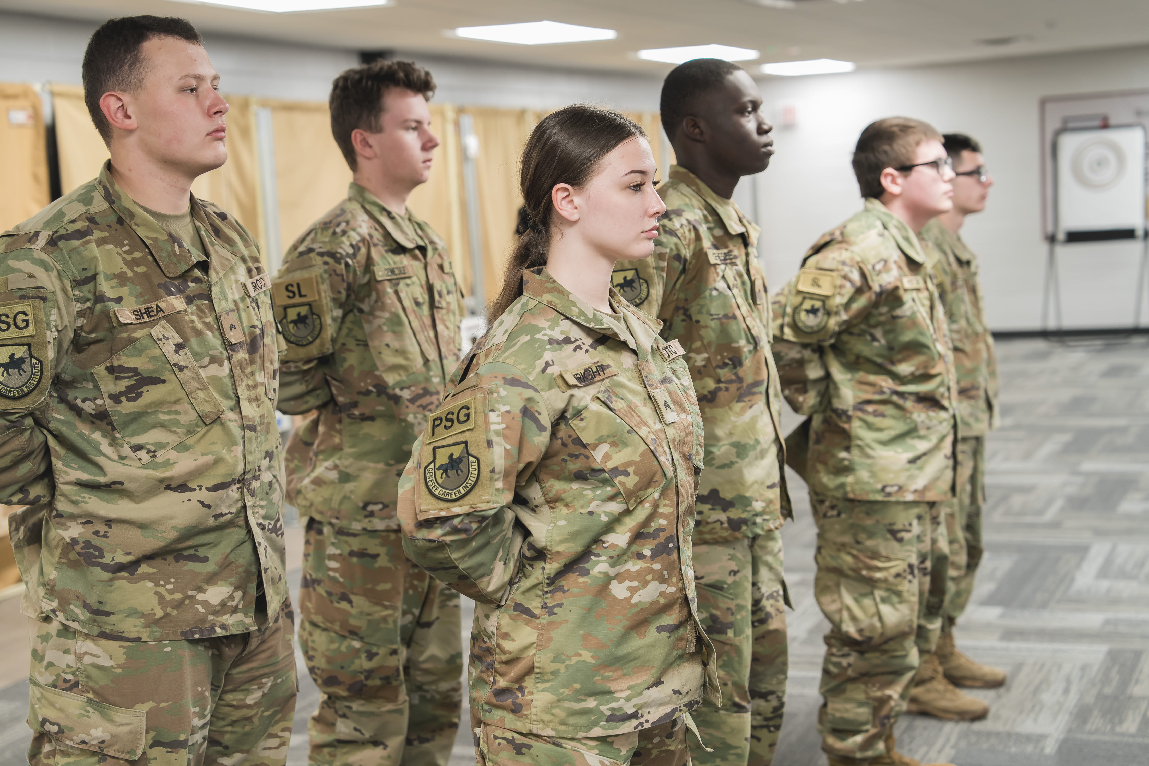 ROTC students standing at attention.