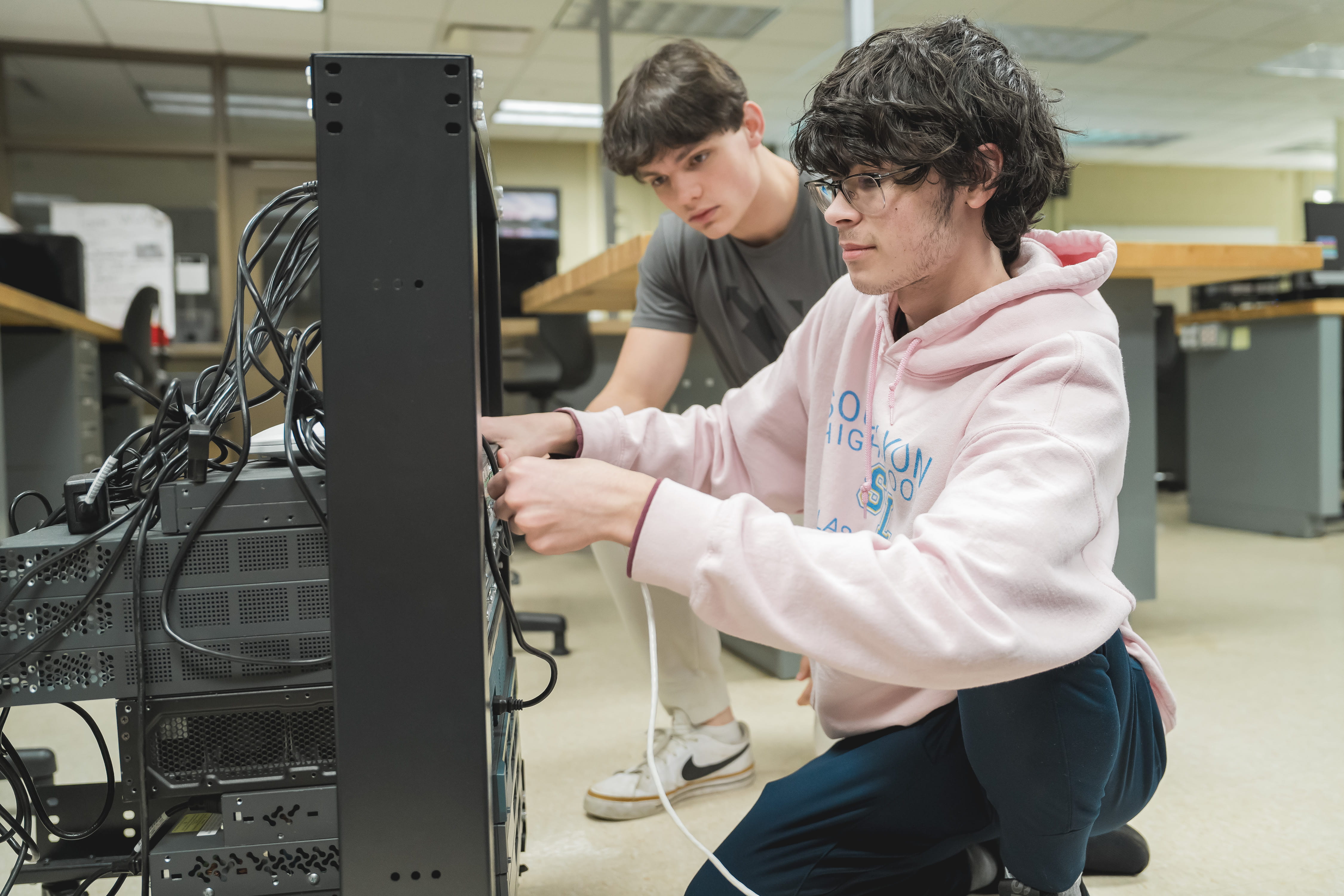 IT Student working on a computer. 