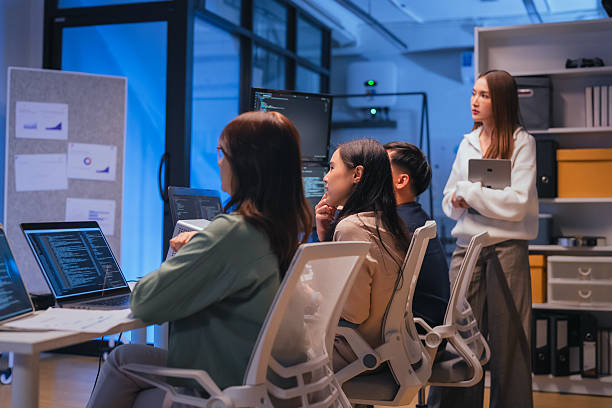 kids looking at a computer 