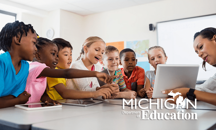 Teacher instructing students using a tablet