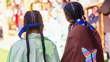 Affected LEAs icon displaying an image of the backs of two young girls wearing decorative shawls