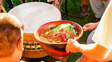 Approach to Consultation icon displaying an image of an Indigenous drum circle